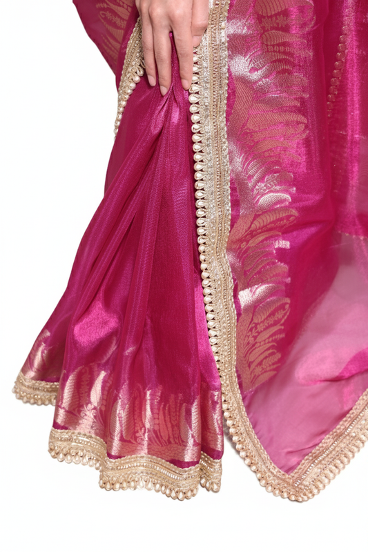 Pari – A pink banarsi tissue silk saree with an elegant golden border and pallu.
