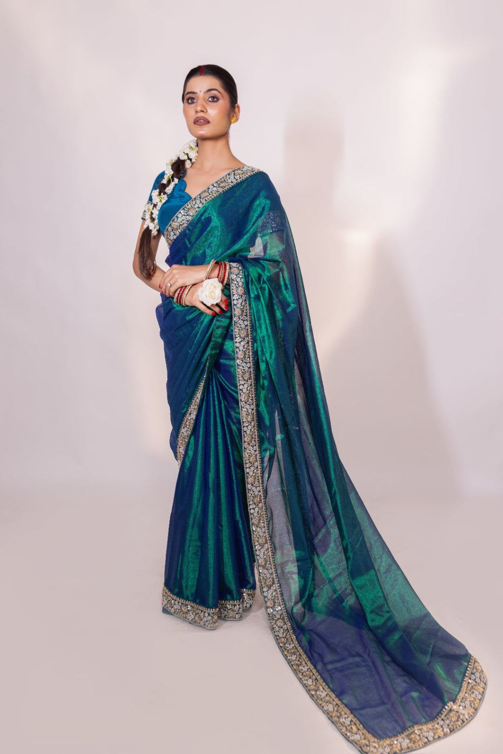 Neelima – Peacock Tissue Saree with Floral Zardozi Border