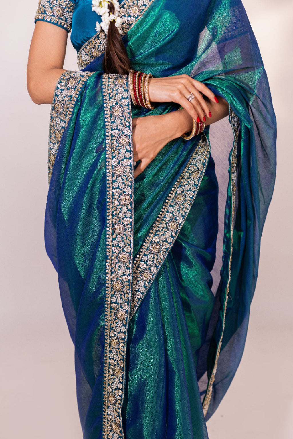 Neelima – Peacock Tissue Saree with Floral Zardozi Border