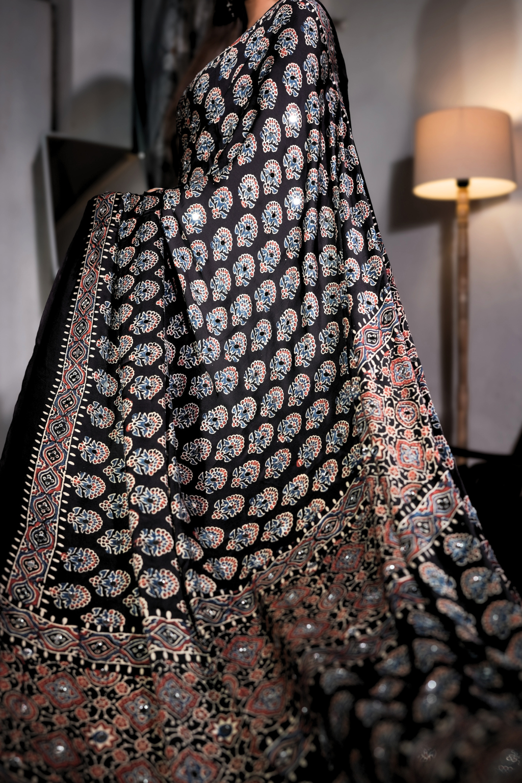 Sheesh Sultana - Jet Black Ajrakh Modal Silk Saree with Mirror Work  Product Description: