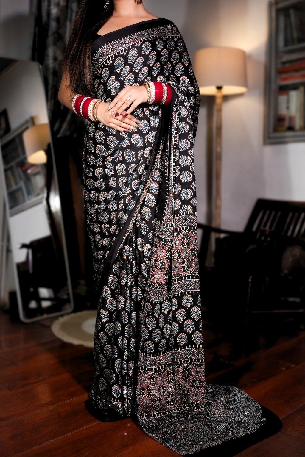 Sheesh Sultana - Jet Black Ajrakh Modal Silk Saree with Mirror Work  Product Description: