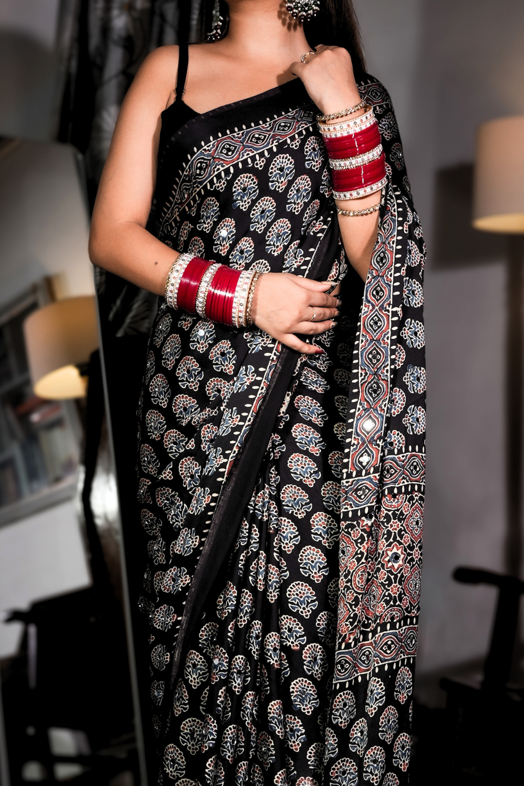 Sheesh Sultana - Jet Black Ajrakh Modal Silk Saree with Mirror Work  Product Description: