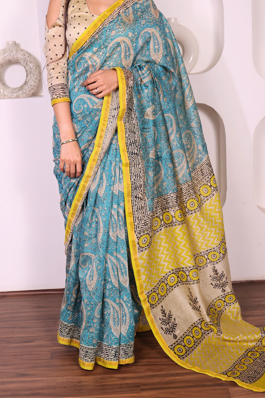 Amrapali – Luminous Turquoise Chanderi Saree with Mustard Block Prints