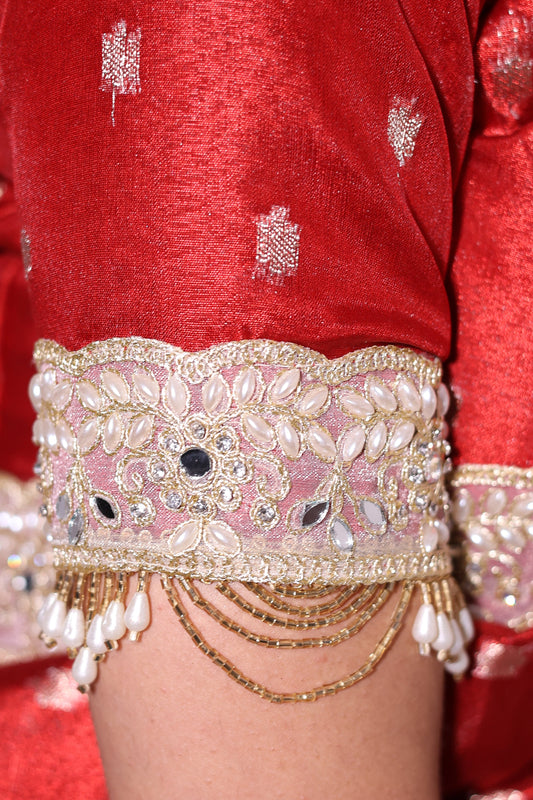 Shagun – A classic red banasri tissue saree with sparkling butis and a beautiful intricate border.